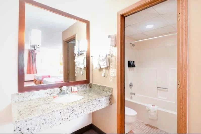 In-room jacuzzi tub at OYO Hotel Tulsa International Airport in Tulsa, OK