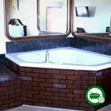 In-room jacuzzi tub at Royal Inn & Suites in Tyler, TX