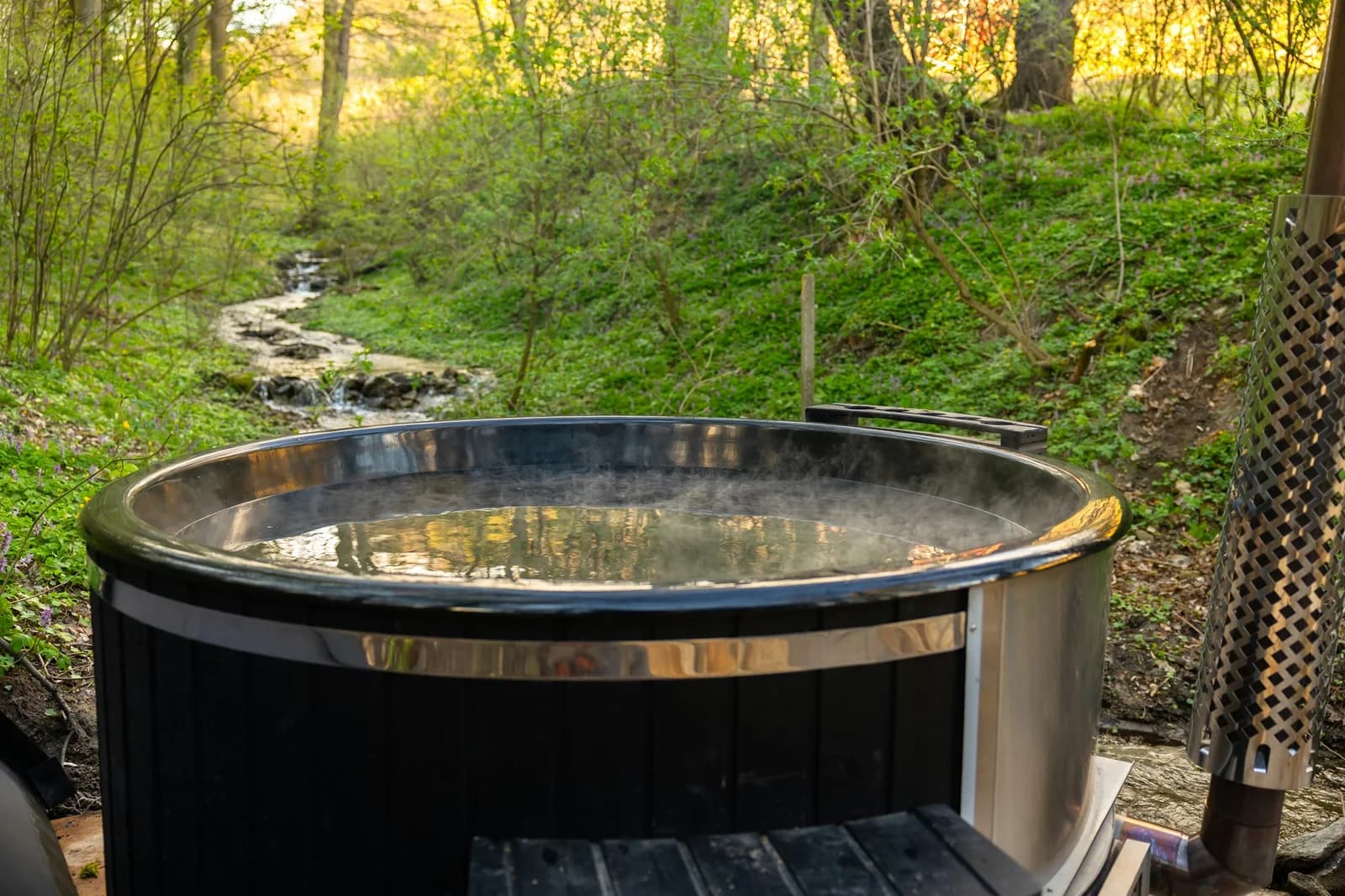 Illustrative hot tub in a woodland setting