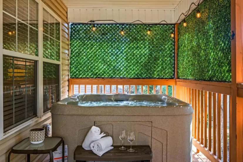 Private outdoor hot tub at 2 Mi to Parkway Hot Tub No Steep Roads in Pigeon Forge, TN