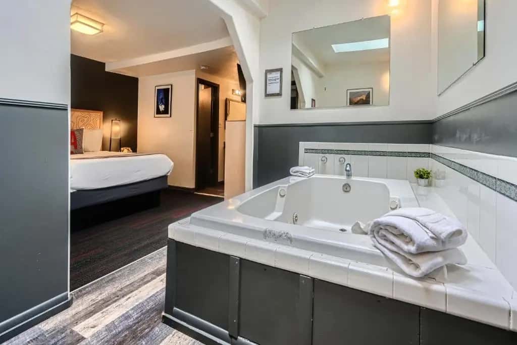 Private in-room jacuzzi tub in the Basecamp Jacuzzi Queen at A-Lodge Boulder