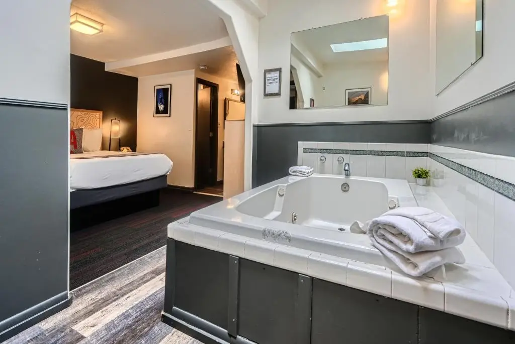 Private in-room jacuzzi tub in the Basecamp Jacuzzi Queen at A-Lodge Boulder