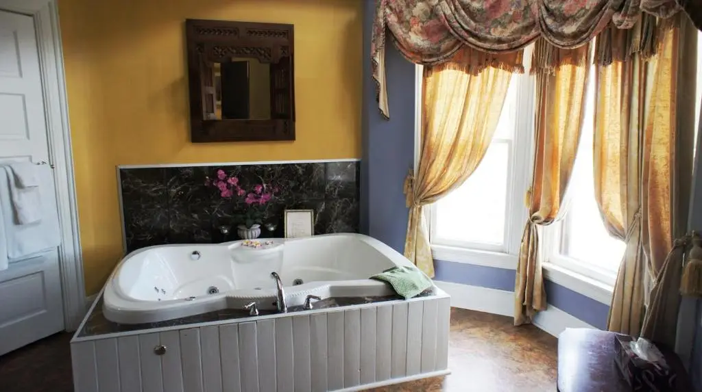 Private in-room jacuzzi tub in the Grand Tower Suite With Spa Bath at A Night to Remember B&B