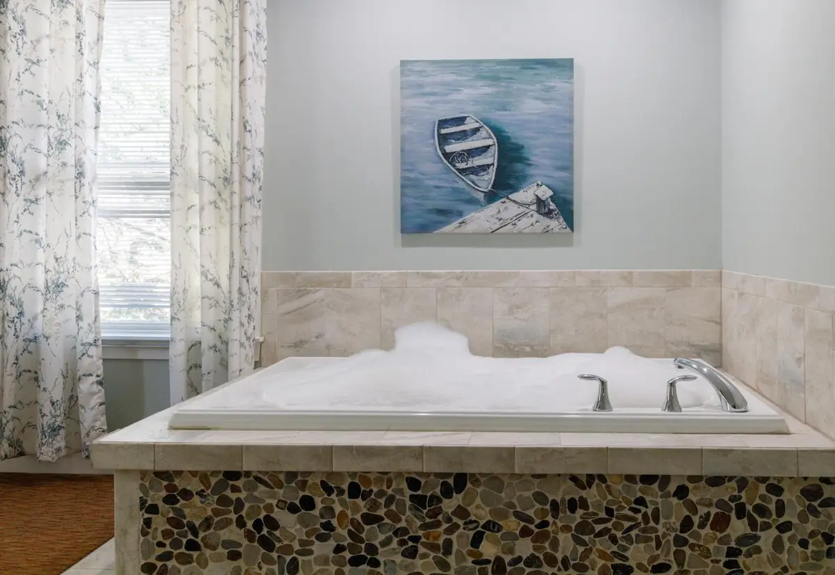Private in-room jacuzzi tub in the King Jetted Tub and Fireplace Compass Rose Building at Admiral’s Inn Resort, Ogunquit