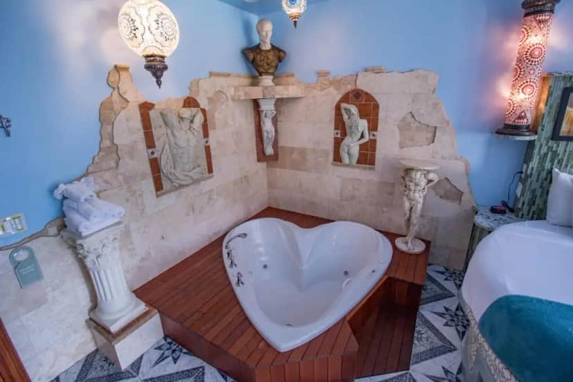 Private in-room jacuzzi in the Roman Rendezvous at Adventure Suites