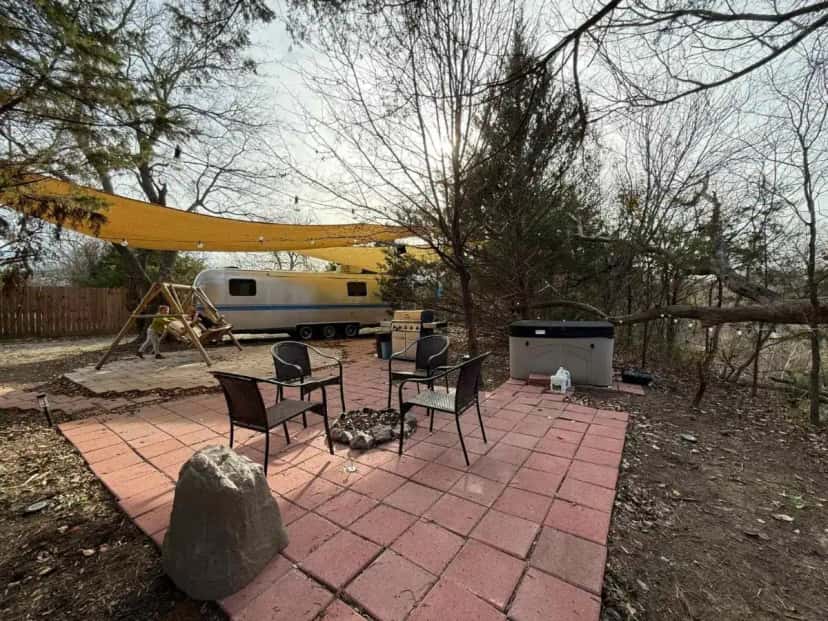 Private outdoor hot tub at Airstream w flush toilet city water hot tub in Lawton, OK