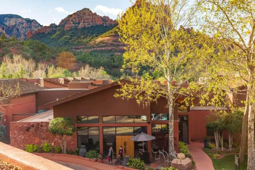 a building with mountains in the background at Amara Resort & Spa in Sedona