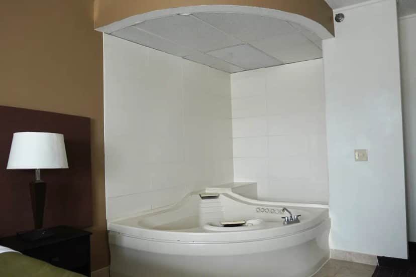 Private in-room jacuzzi at American Inn And Suites Waterford