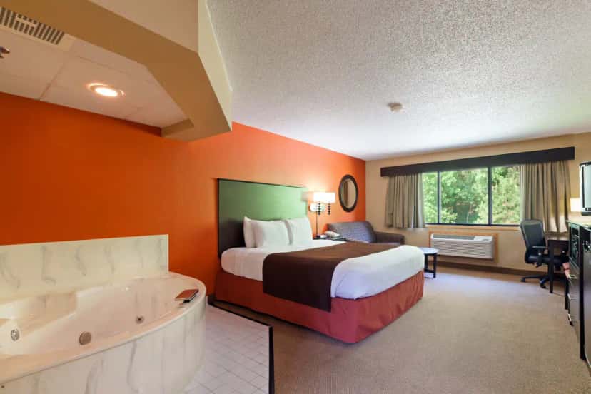 In-room hot tub at AmericInn by Wyndham Algona in Algona, IA