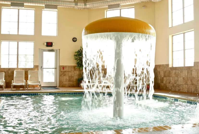 Shared indoor hot tub at AmericInn by Wyndham Fargo Medical Center