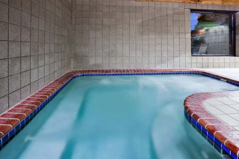 In-room hot tub at AmericInn by Wyndham Plover Stevens Point in Plover, WI