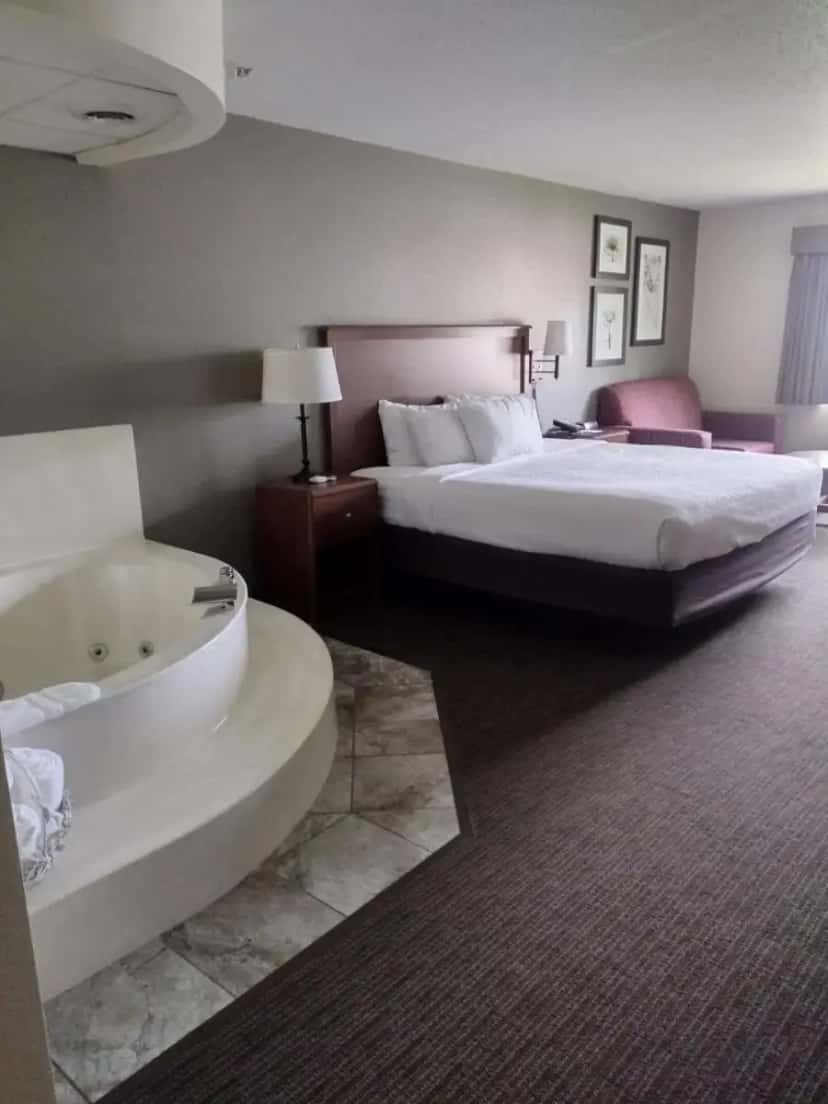 In-room hot tub at AmericInn by Wyndham Red Wing in Red Wing, MN