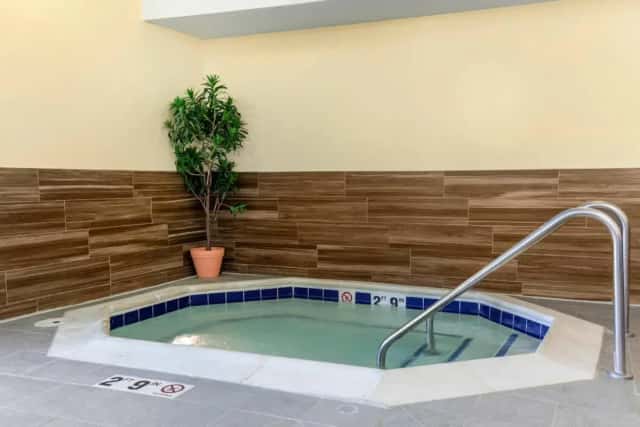 Private in-room hot tub at AmericInn by Wyndham St. Cloud