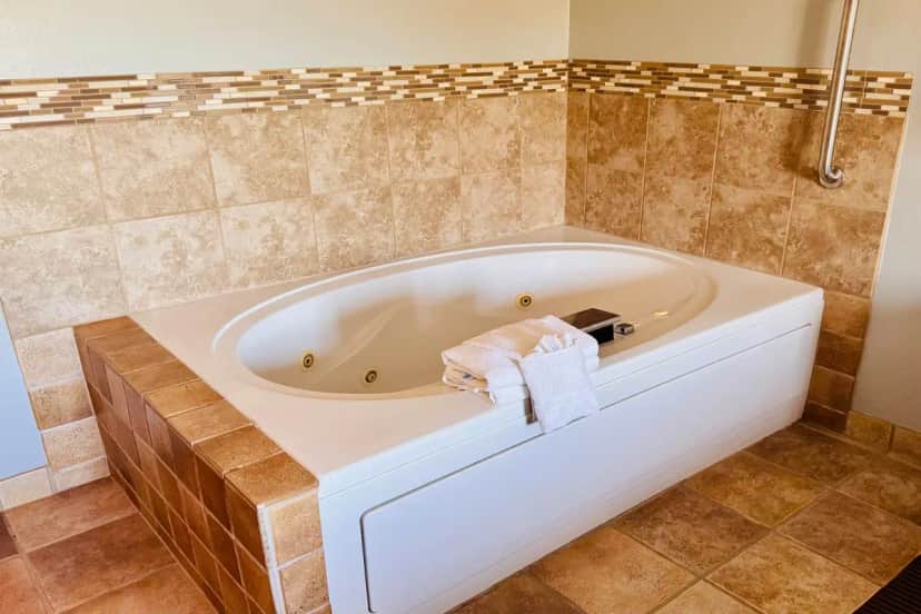 Private in-room jacuzzi tub at AmericInn by Wyndham Stillwater