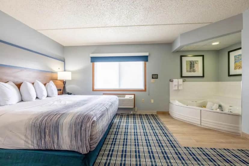 Private in-room jacuzzi in the King Suite - Non-Smoking at AmericInn by Wyndham Sturgeon Bay