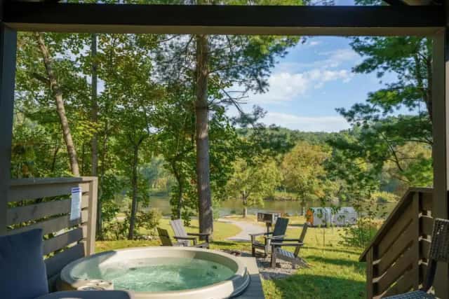 Private in-room hot tub at Asheville River Cabins