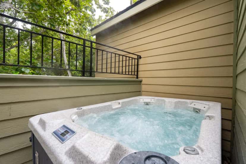 Private outdoor hot tub at Avila Village Inn in Avila Beach, CA