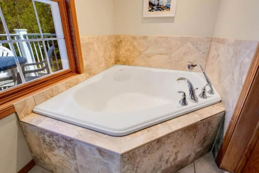 Private in-room jacuzzi tub in the Deluxe Double Room with Balcony and Sea View at Bay Breeze Resort