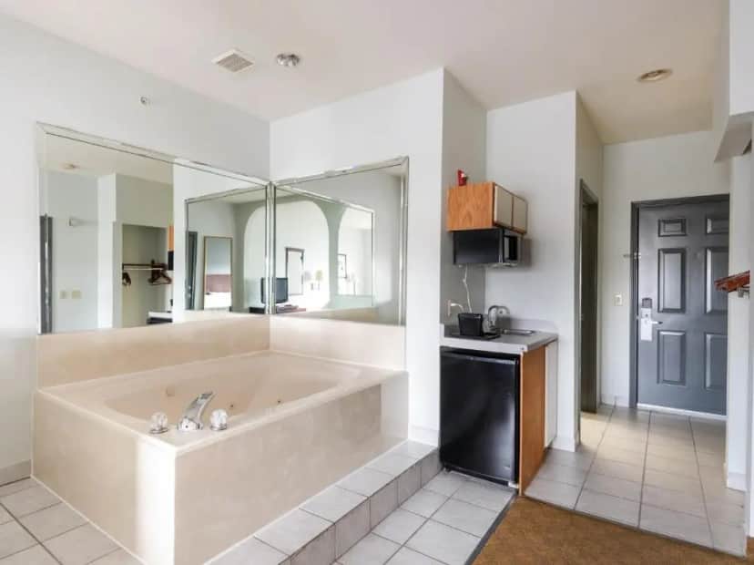 Private in-room jacuzzi tub in the King Suite - Non-Smoking at Baymont by Wyndham Houston Brookhollow