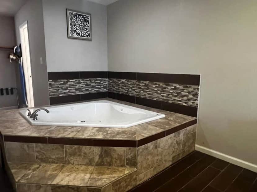 Private in-room jacuzzi in the 1 King Bed, Suite, Hot Tub, Non-Smoking at Baymont By Wyndham Port Arthur/groves Area