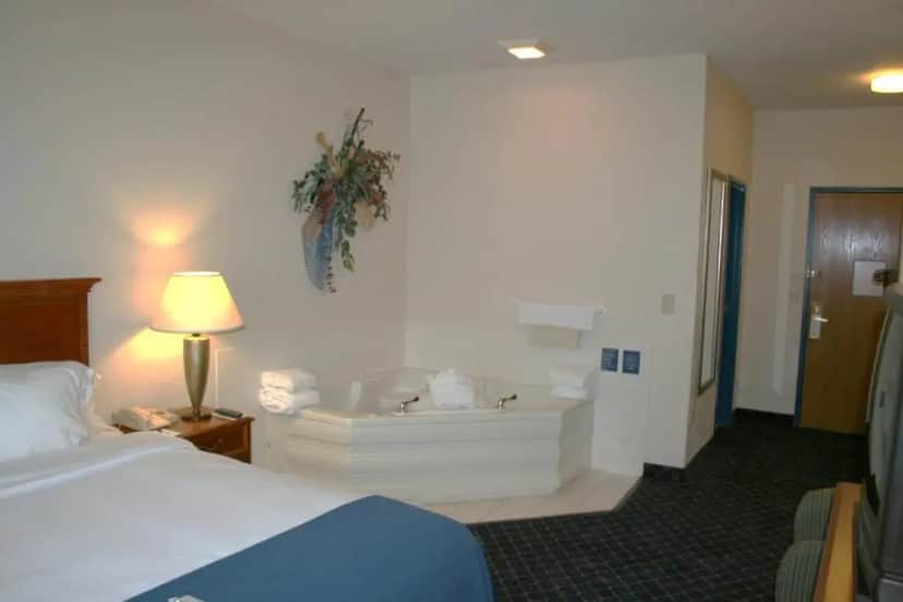 Private in-room jacuzzi tub in the King Suite non smoking at Baymont by Wyndham Portage Indiana Dunes