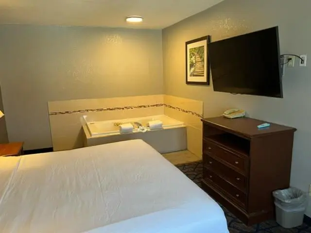 Private in-room jacuzzi tub in the One-Bedroom King Suite - Non-Smoking at Baymont by Wyndham Waukesha