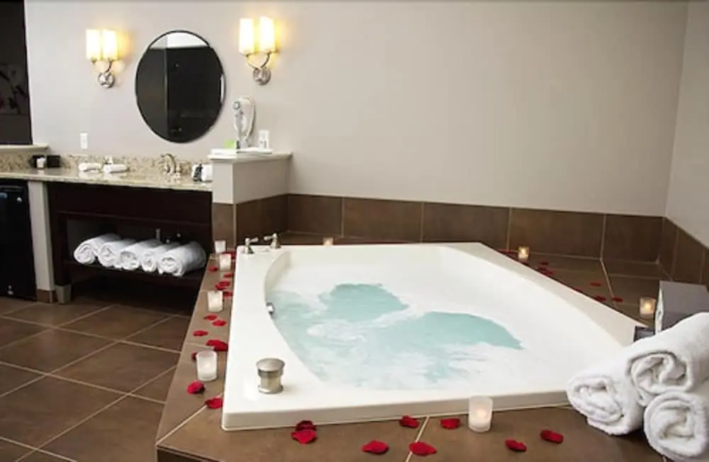 Private in-room jacuzzi tub in the Royal Pool Suite at Belamere Suites Hotel