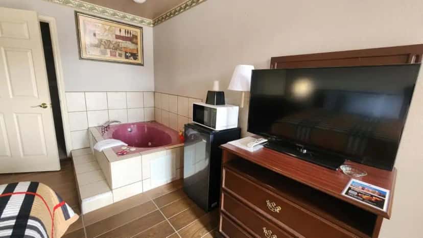In-room hot tub at Benbrook Inn & Suites in Forest Hill, TX