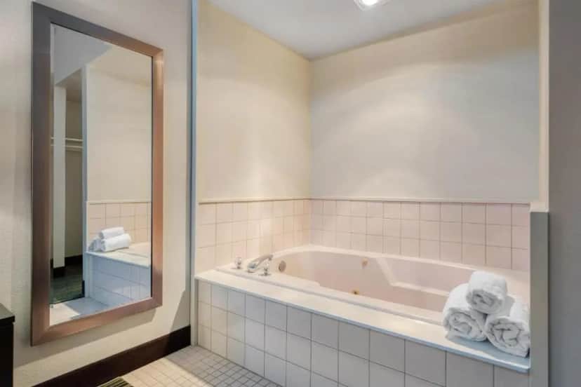 Private in-room jacuzzi tub in the King Room with Whirlpool - Non-Smoking at Best Western Alderwood