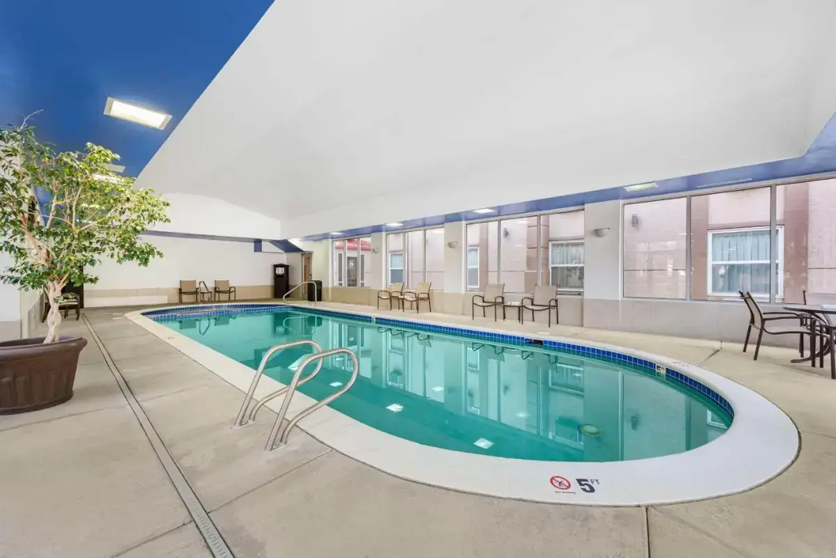 a pool in the middle of a building at Best Western Executive Inn & Suites in Colorado Springs