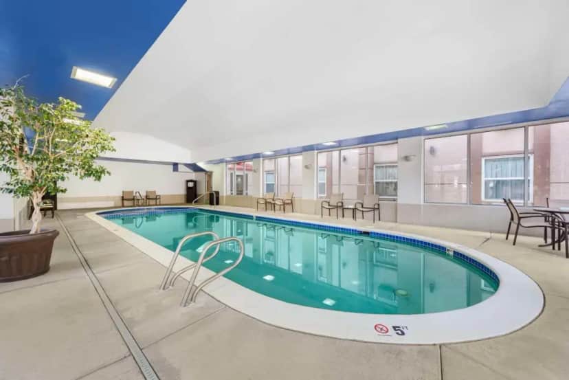 a pool in the middle of a building at Best Western Executive Inn & Suites in Colorado Springs