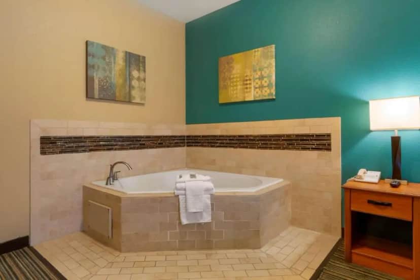 Private in-room jacuzzi tub in the Deluxe King Room - Non-Smoking at Best Western Governors Inn & Suites