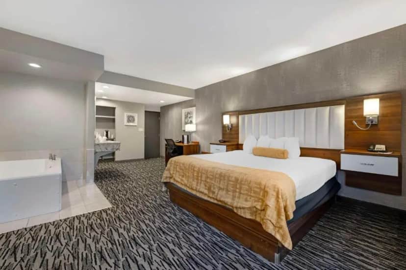 Private in-room jacuzzi tub in the King Suite with Spa Bath - Non-Smoking at Best Western On The Avenue
