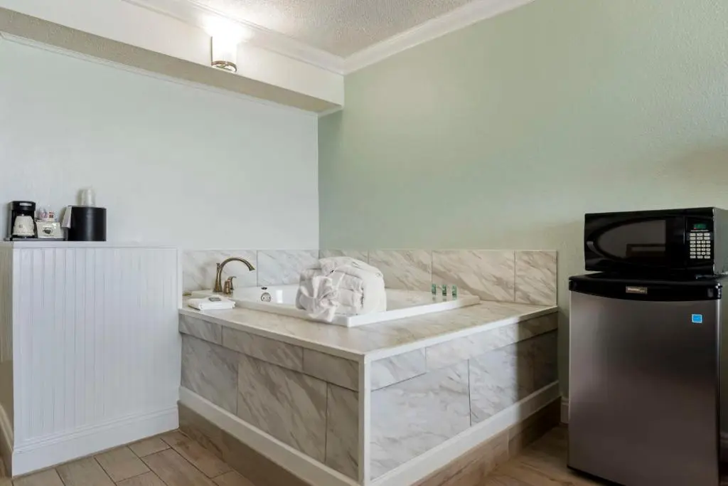 Private in-room jacuzzi tub in the King Room with Spa Bath and Gulf View - Non-Smoking at Best Western On The Beach