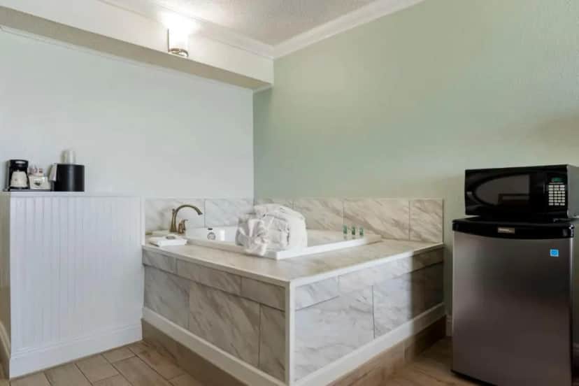 Private in-room jacuzzi tub in the King Room with Spa Bath and Gulf View - Non-Smoking at Best Western On The Beach