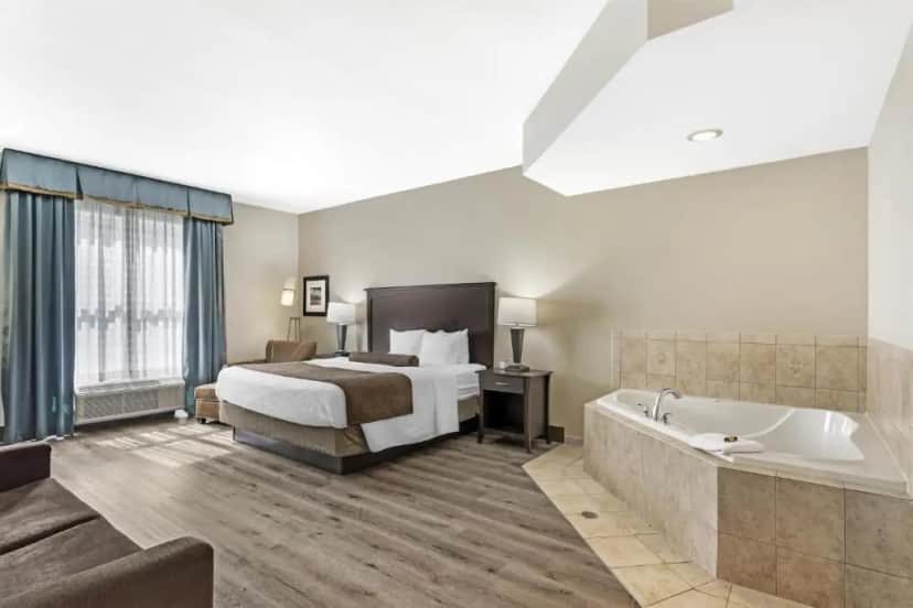 Private in-room jacuzzi tub in the King Room with Whirlpool - Non-Smoking at Best Western Plus Chain Of Lakes Inn & Suites