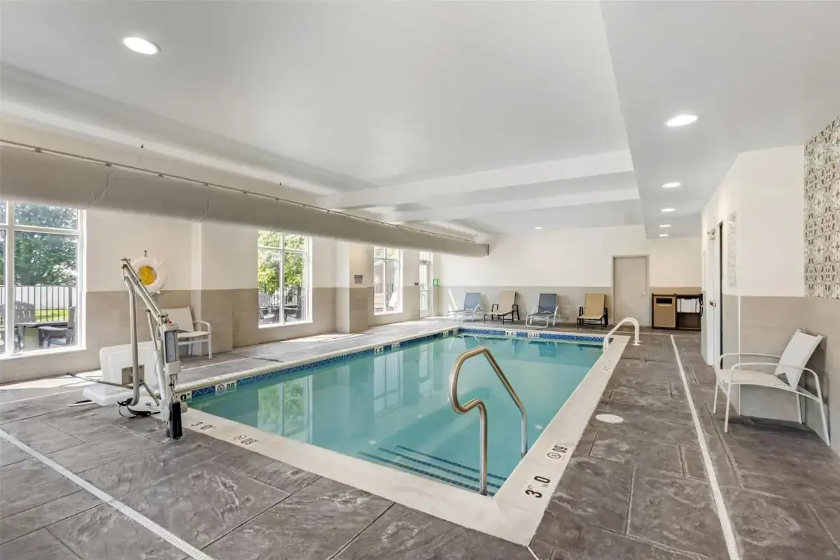 a large swimming pool in a hotel room at Best Western Plus Hershey in Hershey