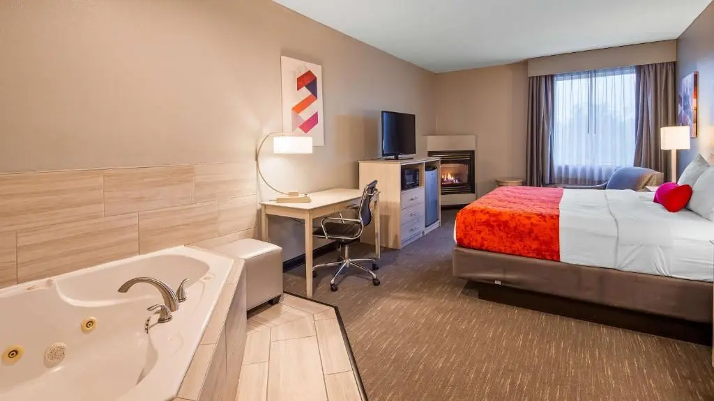 Private in-room jacuzzi in the King Suite with Spa Bath and Fireplace at Best Western Plus New Cumberland Inn & Suites