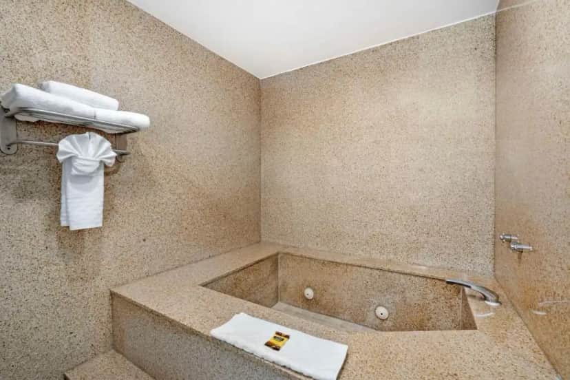 Private in-room jacuzzi tub in the King Room with Sofa Bed and Jacuzzi at Best Western Plus Newport Mesa Inn