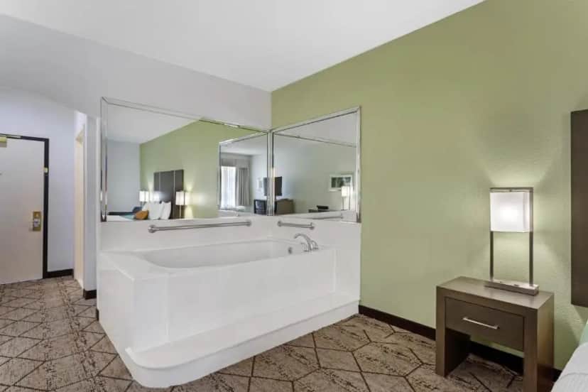 Private in-room jacuzzi tub in the King Suite with Spa Bath - Non-Smoking at Best Western Plus North Houston Inn & Suites