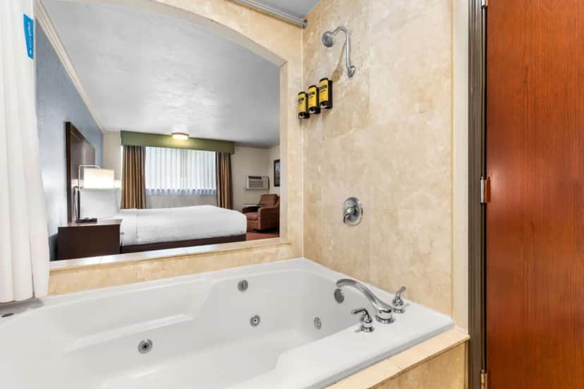 Private in-room jacuzzi tub in the Large King Room with Jetted Tub at Best Western Plus Parkway Inn
