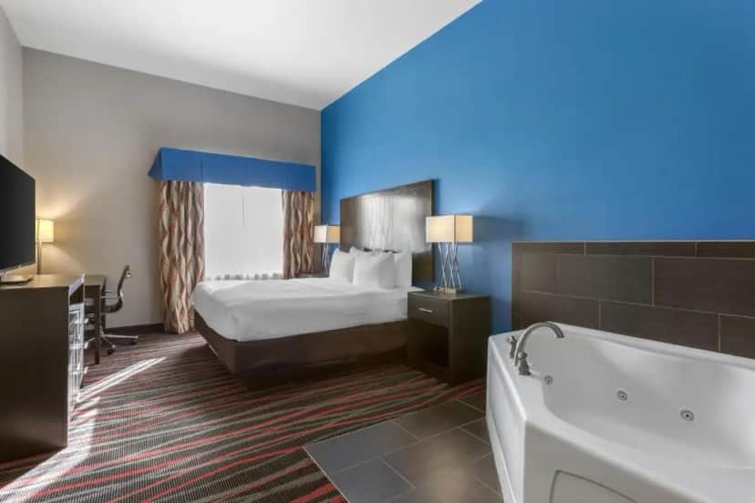 Private in-room jacuzzi tub in the King Suite with Whirlpool - Non-Smoking at Best Western Plus Tech Medical Center Inn
