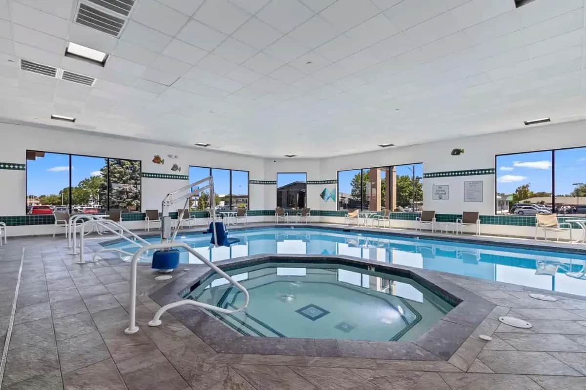 a pool in a hotel with a swimming pool at Best Western Plus Twin Falls Hotel in Twin Falls