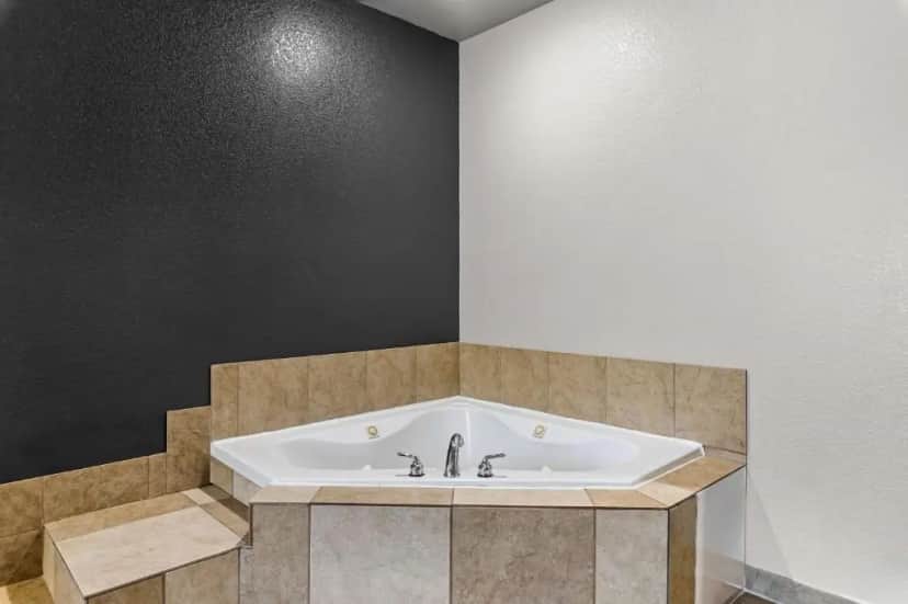 Private in-room jacuzzi tub in the King Suite with Whirlpool - Non smoking at Best Western Sherwood Inn & Suites
