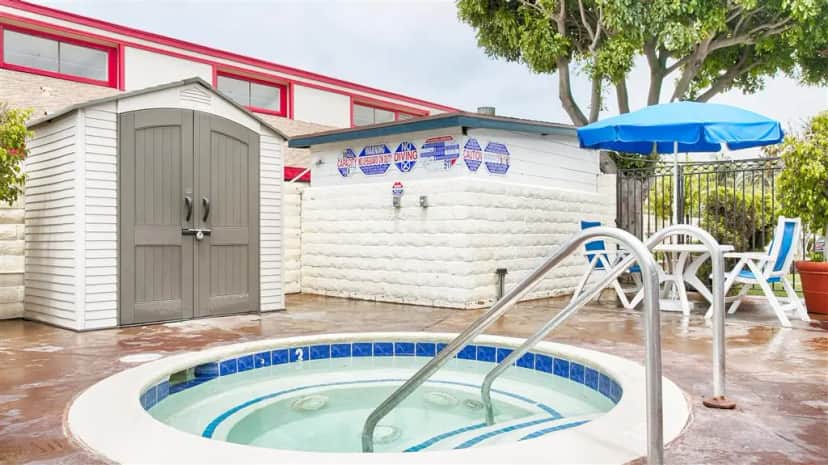 Shared outdoor hot tub at Best Western Surf City