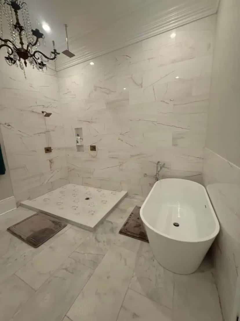 Deep soaking tub at Blue Crawfish Boutique Hotel & Pool Bar in Harvey, IL