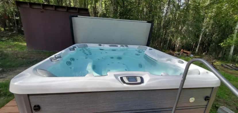 Private outdoor hot tub at Borealis Bungalow and Hot Tub in Fairbanks, AK