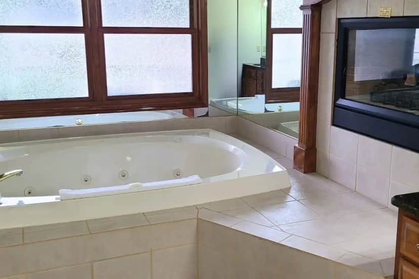 Private in-room jacuzzi tub in the Deluxe Whirlpool One Bedroom City View at Bridgeport Waterfront Resort