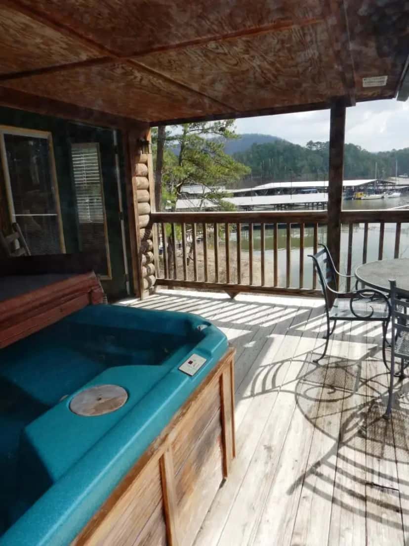 Private outdoor hot tub at C12 - Luxury, loft, log-sided two bedroom Harbor North cottage on Lake Ouachita in Mount Ida, AR