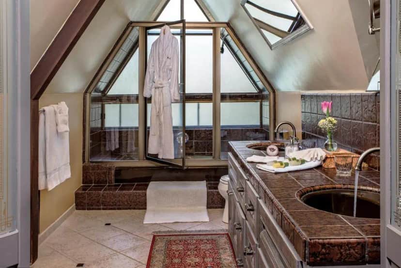 a bathroom with a sink and a window at Candlelight Inn Napa Valley in Napa